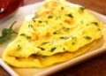 Ricetta frittata alle erbe con prosciutto cotto e formaggio grattugiato